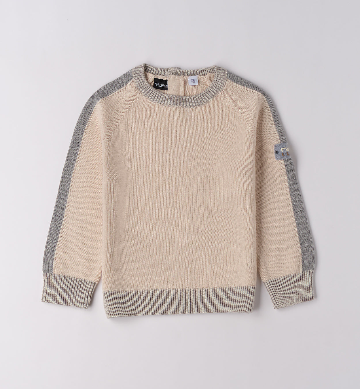 maglioncino bambino in caldo cotone beige e grigio con bottoni sul retro