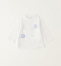 outfit bambina elegante con pantalone morbido e maglia floreale