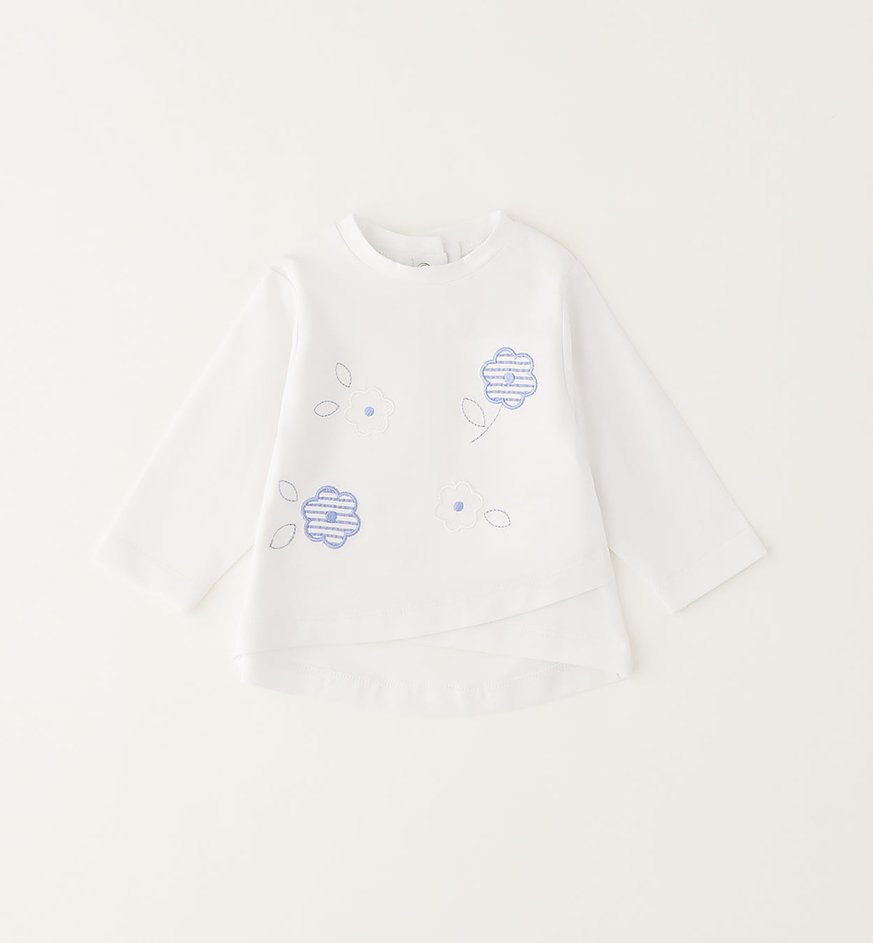 outfit bambina elegante con pantalone morbido e maglia floreale