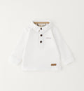outfit bambino casual elegante con pantalone beige fantasia