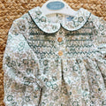 Pagliaccetto bimba floreale verde Sardon in 100% cotone con punto smock