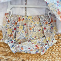Abito pagliaccetto bimba floreale Yoedu con punto smock e pagliaccetto coordinato