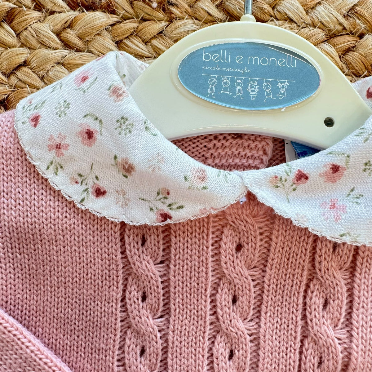 Pagliaccetto bimba rosa in maglia con parte floreale e colletto coordinato