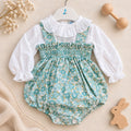 Pagliaccetto bimba verde acqua con fantasia floreale, lavorazione smock e blusa bianca con volant