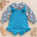 Pagliaccetto bimba verde petrolio in maglia con camicia floreale e pon pon