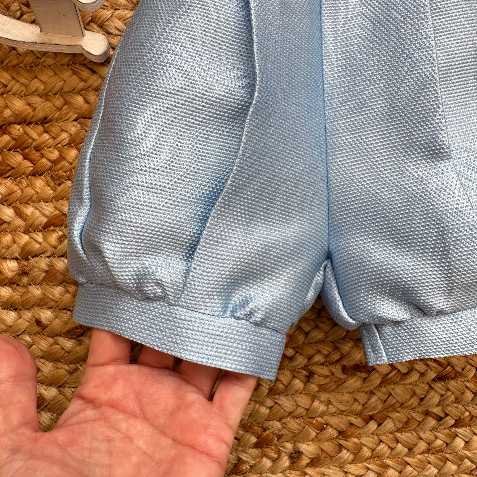 pantaloncino celeste con bretelle completo battesimo bimbo