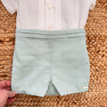 Dettaglio tessuto verde salvia lino e cotone pantaloncino bimbo