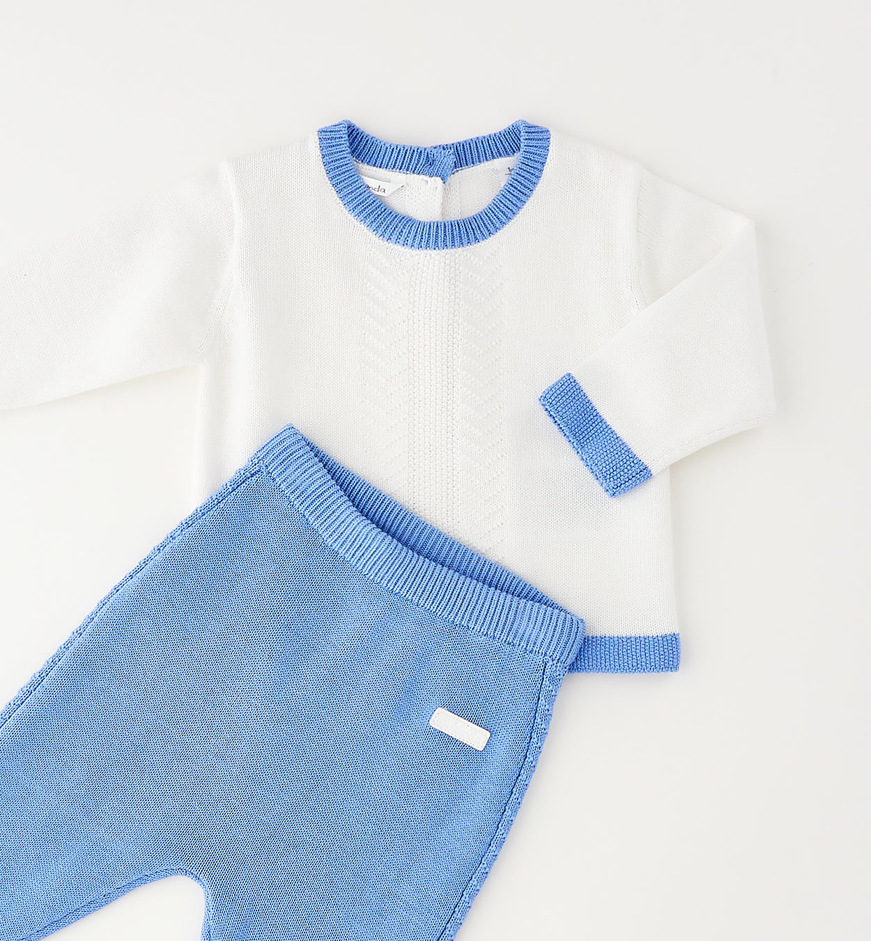 Pantalone azzurro coordinato tutina neonato