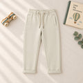 Pantalone bimbo beige in cotone con vita elasticizzata coulisse e tasche vista frontale