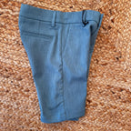 COMPLETO ESTIVO BAMBINO: POLO BIANCA E PANTALONI VERDE SALVIA