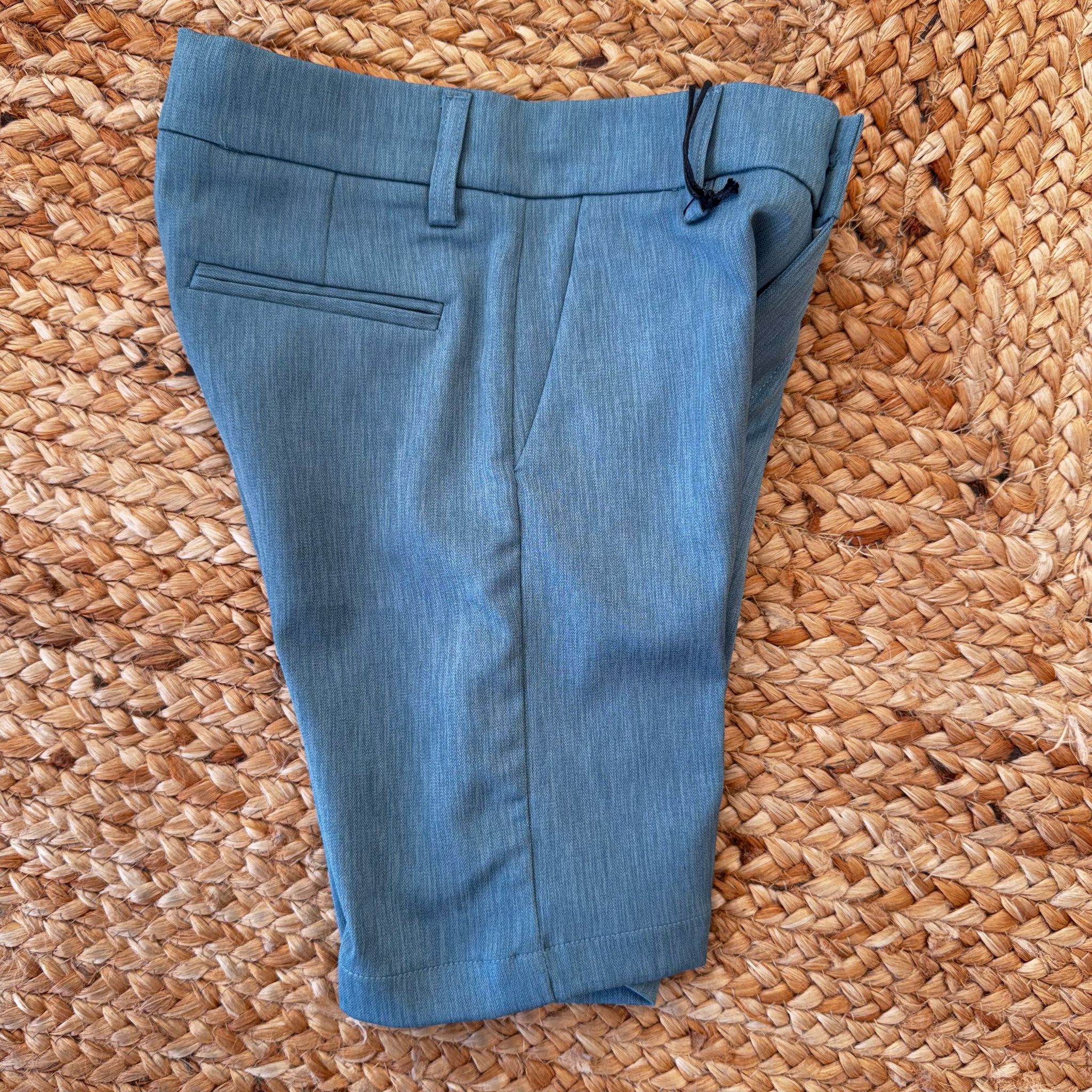 COMPLETO ESTIVO BAMBINO: POLO BIANCA E PANTALONI VERDE SALVIA