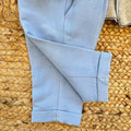 Completo battesimo bimbo con cardigan beige doppiopetto, pantaloni azzurri e papillon