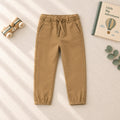 Pantaloni bimbo marrone con vita elasticizzata, coulisse e tasche laterali