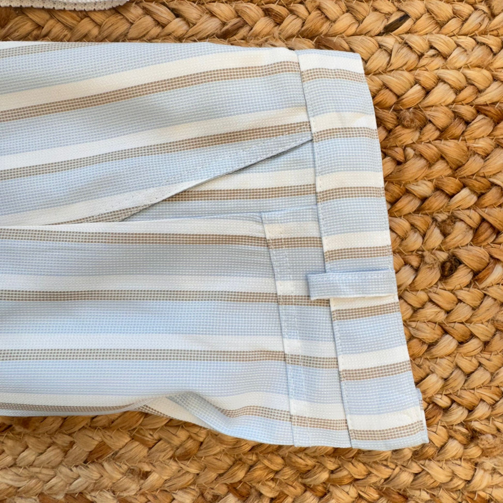 papillon elegante a righe celeste e panna per battesimo neonato