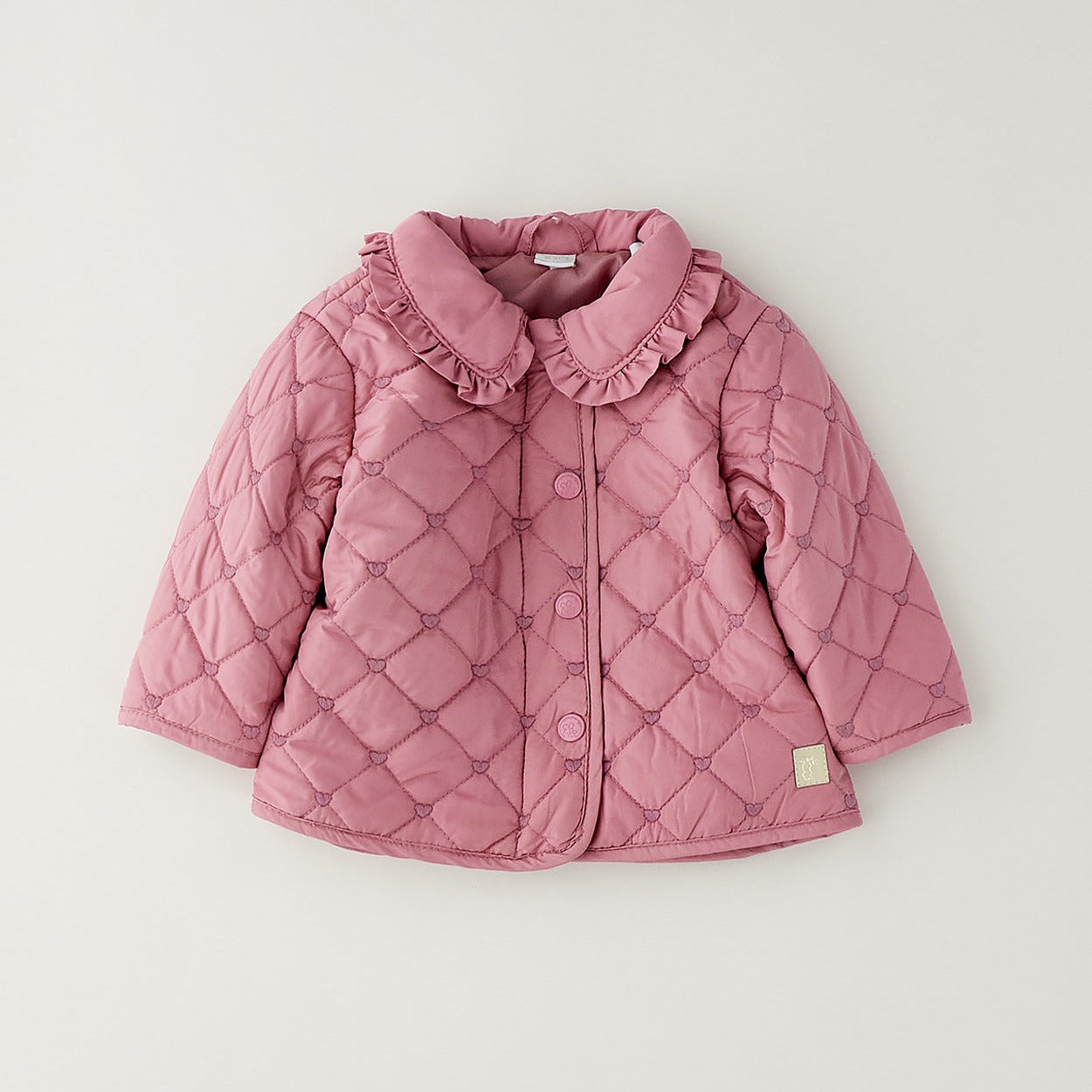 Piumino bimba rosa trapuntato con colletto volant e cuori tono su tono