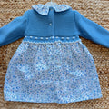 Abito bimba azzurro floreale con parte superiore in maglia e gonna fantasia