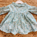 Abito bimba in cotone floreale verde acqua con punto smock e colletto arricciato