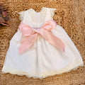 retro abito bimba con grande fiocco rosa cipria