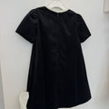 Abito elegante bambina nero con tre maxi fiocchi avorio e maniche a palloncino