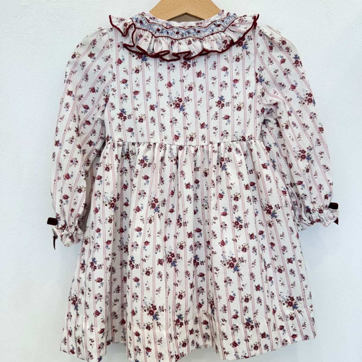 Abito bimba punto smock floreale con fiocchi in velluto bordeaux