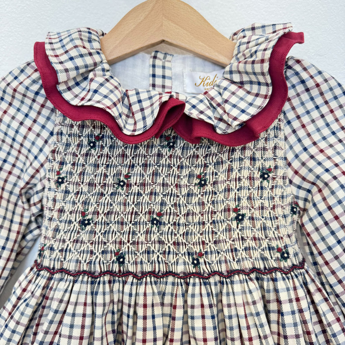 Abito bimba tartan punto smock con dettagli bordeaux
