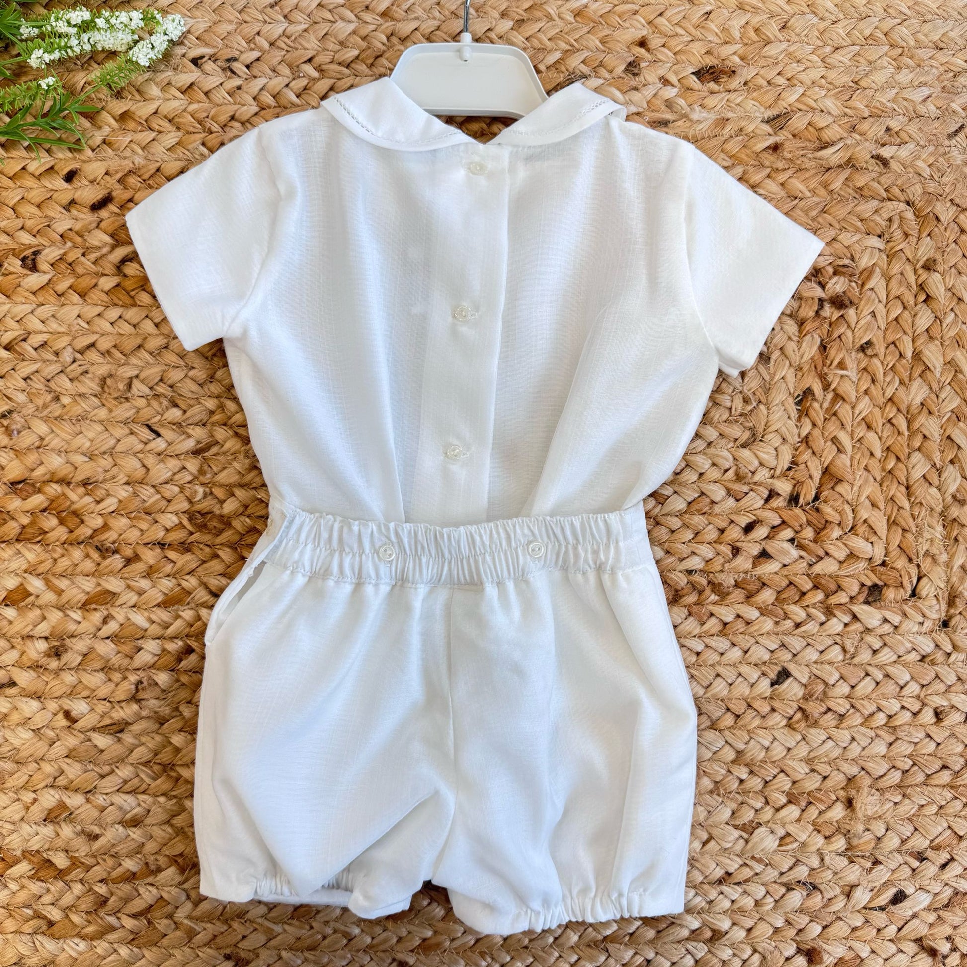 Retro completo bianco con pantaloncino e fascia elastica