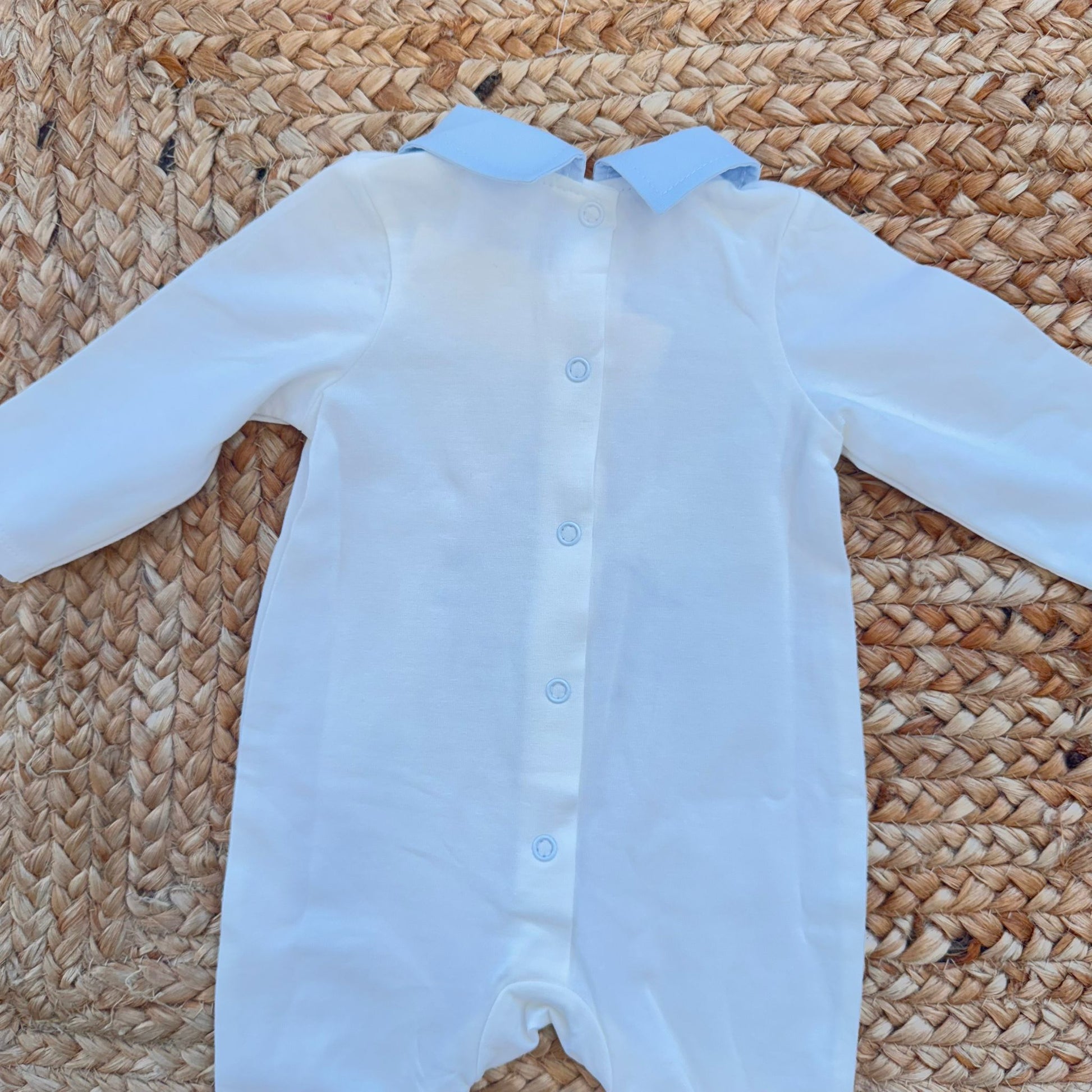 Retro tutina bimbo panna con chiusura a bottoni automatici