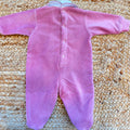 Tutina neonata in ciniglia rosa con ricamo floreale e fiocco elegante
