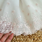 Fiocco in tulle sul retro dell’abito battesimo Mimilù.