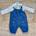 Salopette bimba in 100% cotone denim blu con tasche e ricami floreali beige