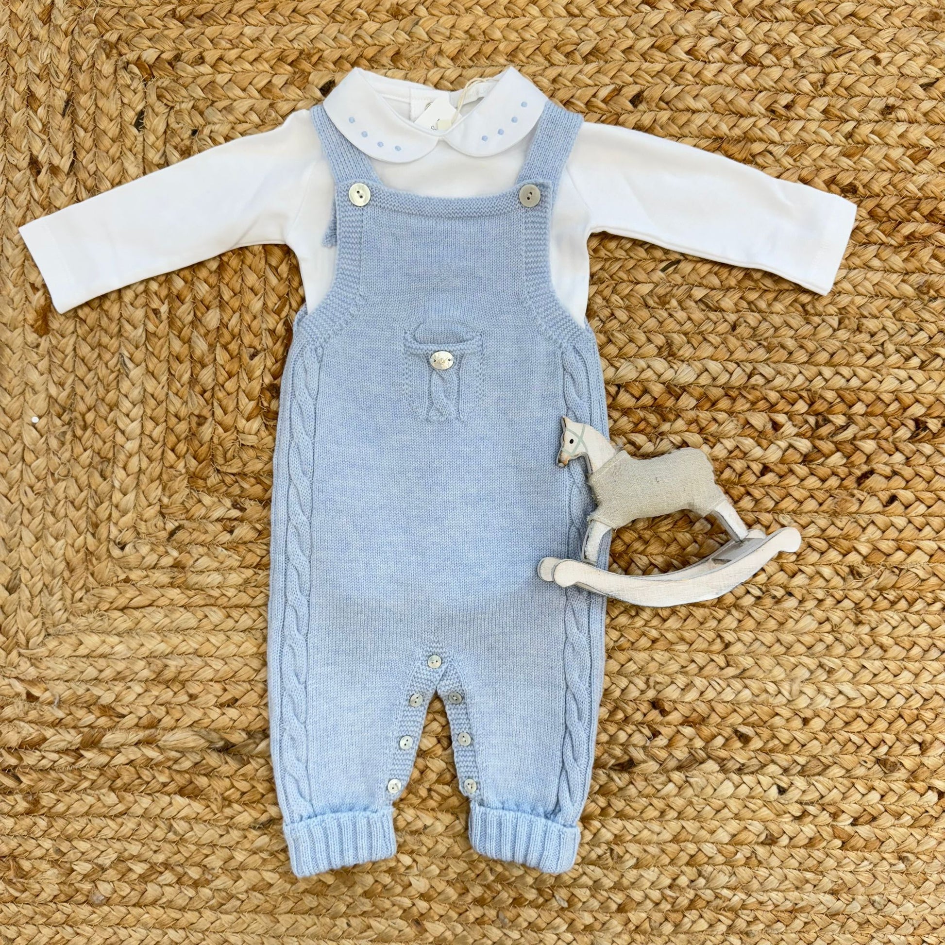 salopette neonato azzurra in pura lana