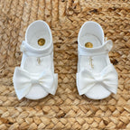 Scarpe culla in raso bianco con maxi fiocco