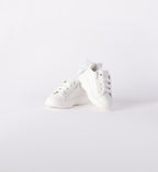 
Scarpe bianche bambina con fiocco e zip laterale primi passi

