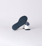 Suola scarpe bimbo antiscivolo blu con dettaglio grip