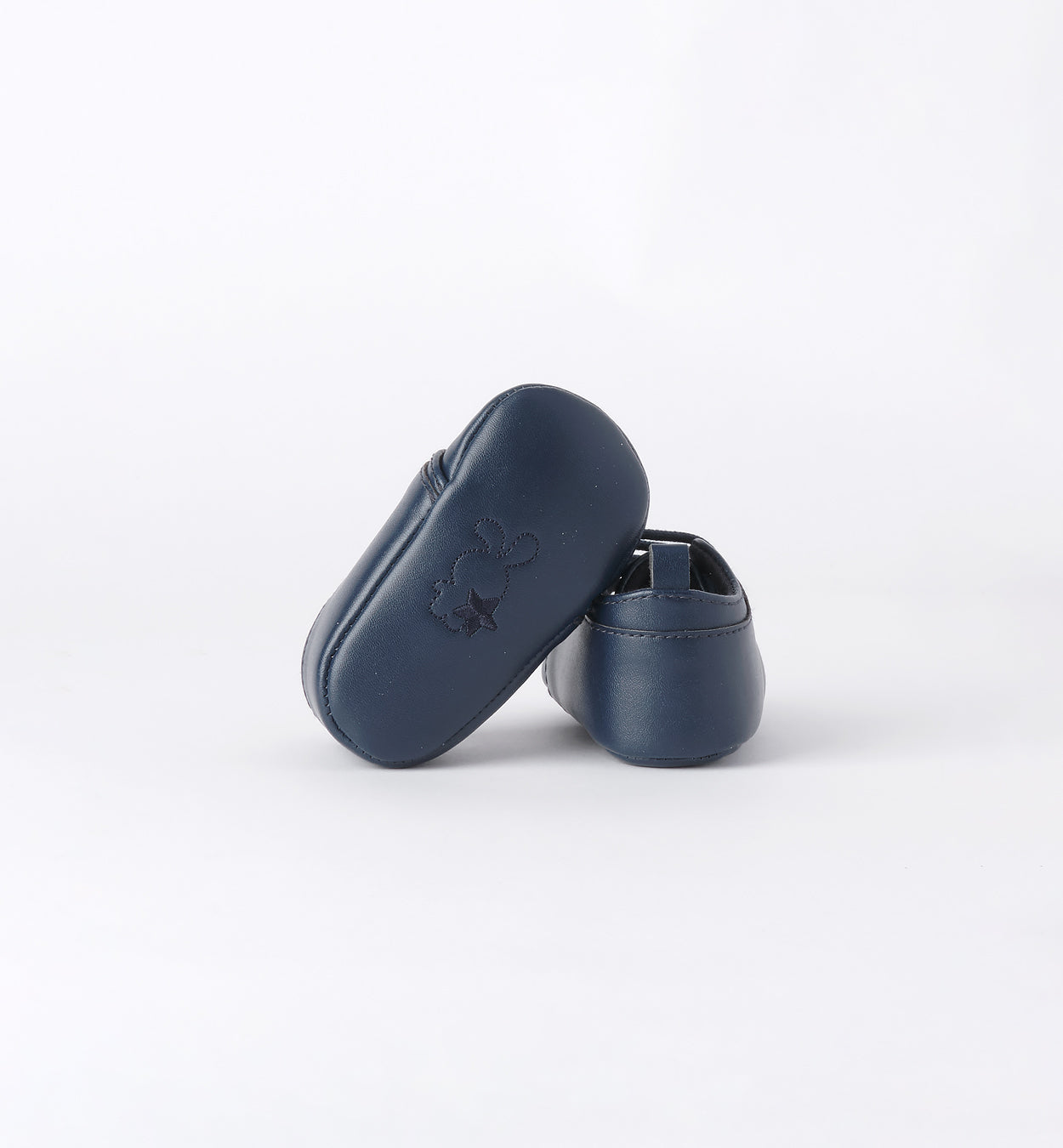 Suola scarpette blu bimbo con logo ricamato