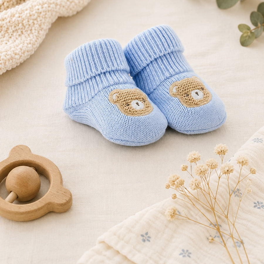 Calzine neonato in caldo cotone azzurre con orsetto