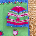 scarpette pura lana verdi e blu con dettagli rosa