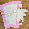 Uscita clinica neonata in pura lana con copertina latte e rosa confetto Made in Italy.