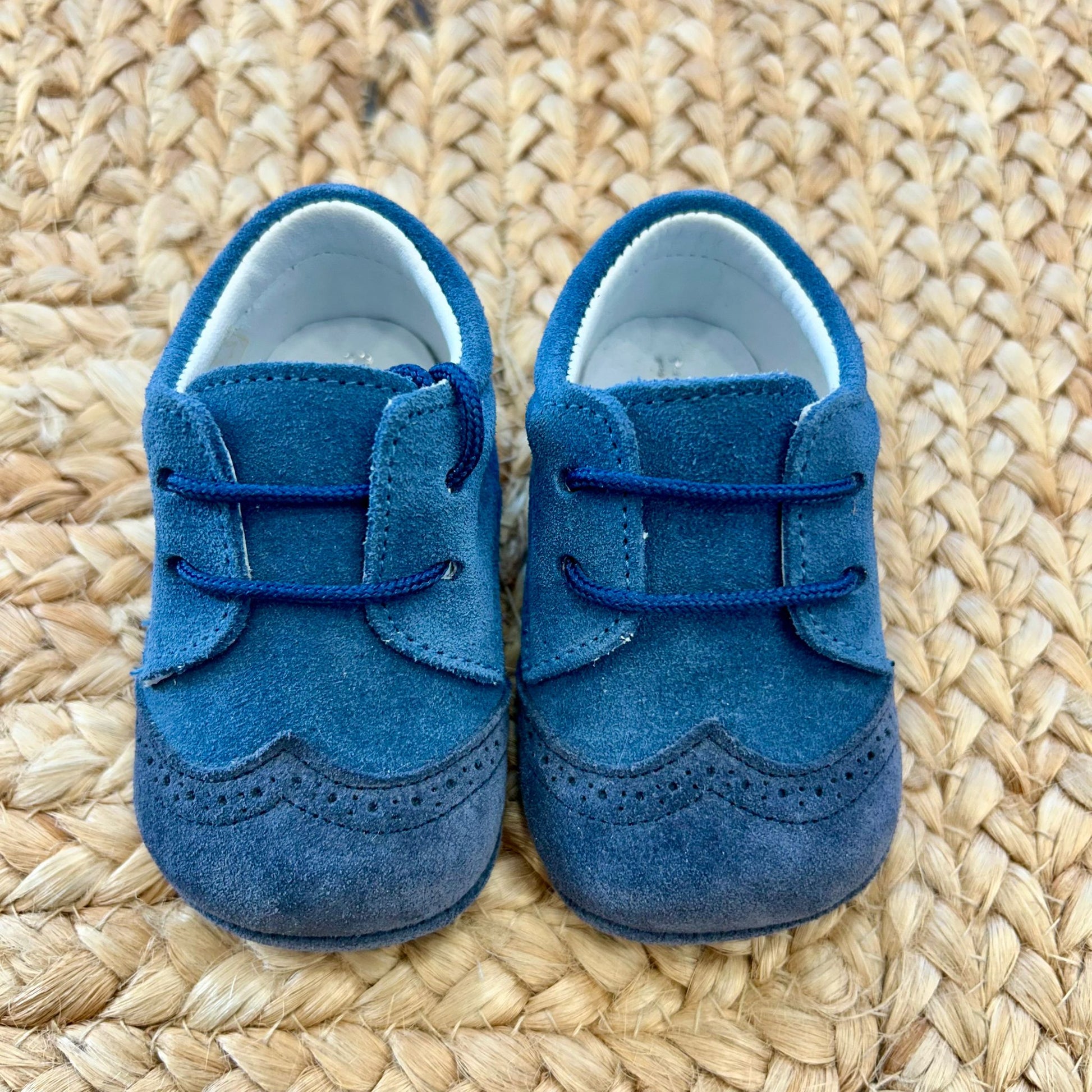 “scarpine battesimo bimbo blu brogue vista frontale”