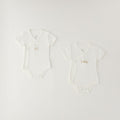 Set 2 body neonato unisex in caldo cotone bianco con apertura incrociata e decorazioni con orsetti