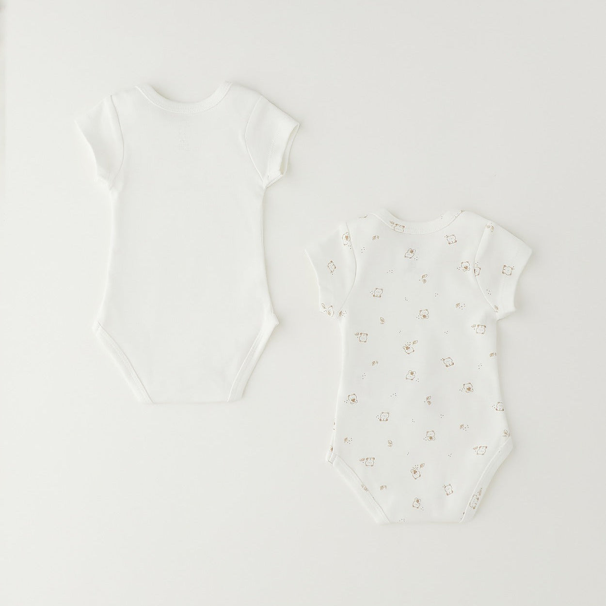 Set 2 body neonato unisex in caldo cotone bianco con scritta e fantasia orsetti per corredino nascita