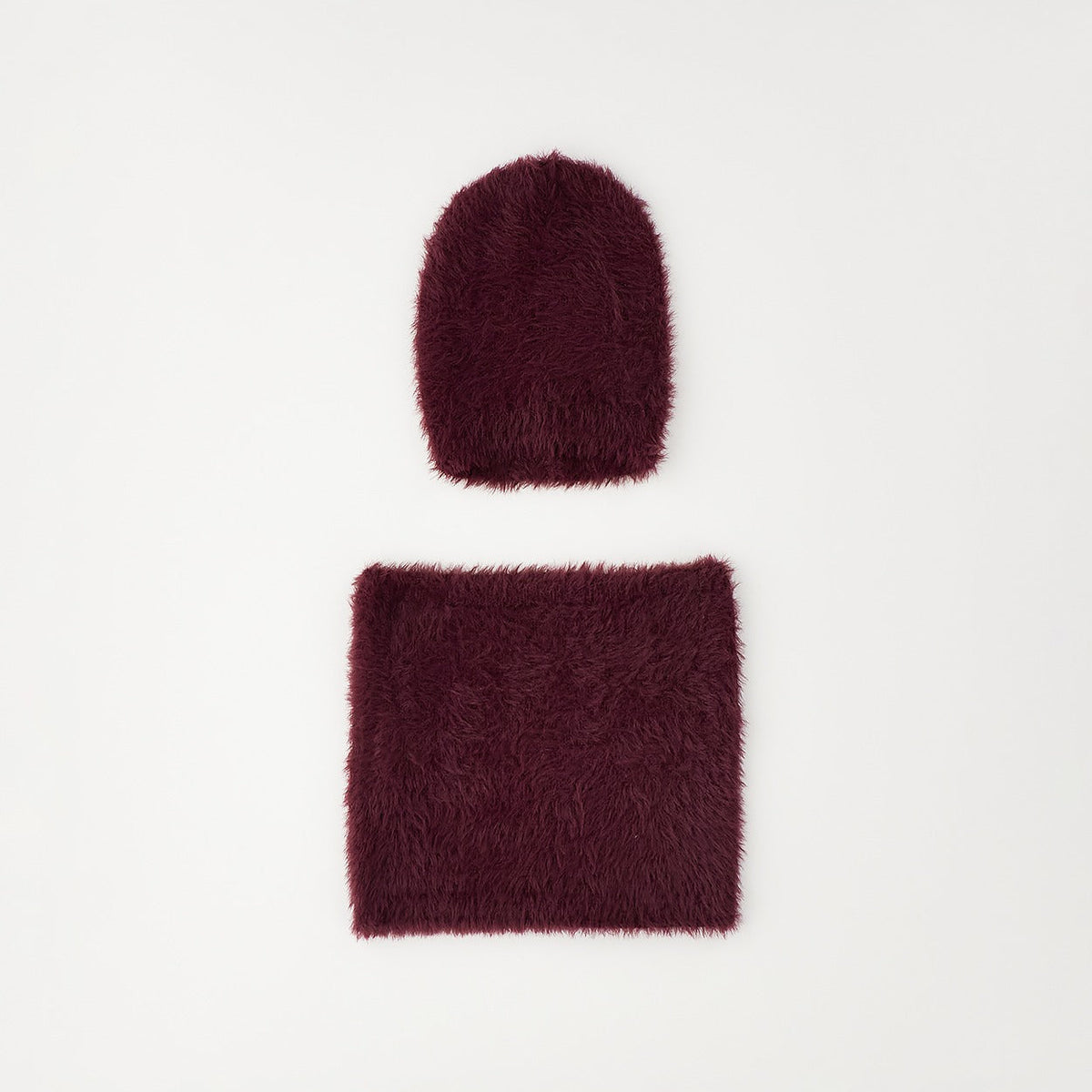 Set cappello e scaldacollo bimba bordeaux con texture morbida e vaporosa