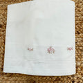 Set lenzuola babyculla bianco con ricami floreali rosa per neonata