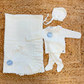 Set nascita neonata panna con copertina, maglia, ghettina e cuffietta in maglia 100% acrilico.