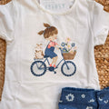 t-shirt bimba cotone con grafica bambina in bicicletta