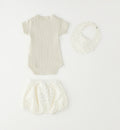Shorts neonato in cotone con fantasia delicata
