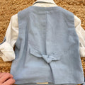 dettaglio tessuto completo bimbo elegante azzurro