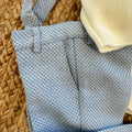 Completo battesimo bimbo azzurro e avorio con cardigan doppiopetto, pantalone con bretelle e papillon