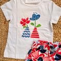 t-shirt bimba cotone bianco con decorazione floreale stilizzata