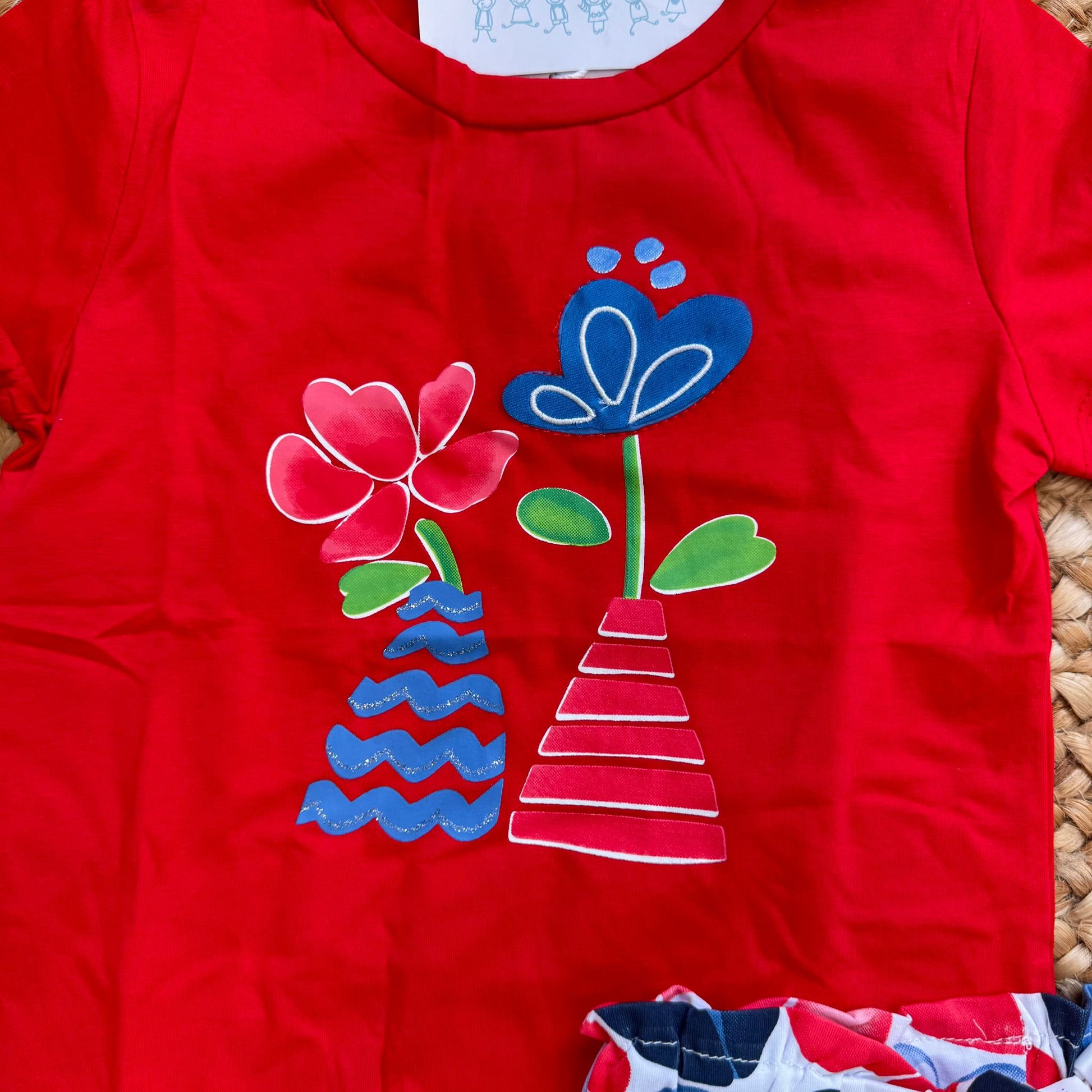 t-shirt bimba cotone rosso con decorazione floreale